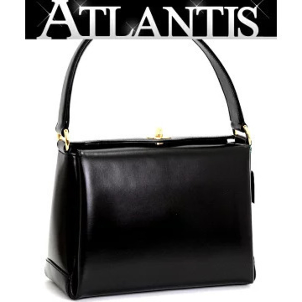 Gucci turn lock handbag leather black